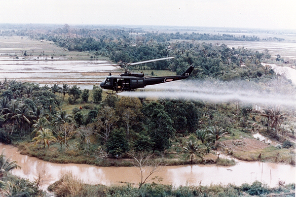 Helicopter Spraying Agent Orange, Source: U.S. Army via WikiMedia Commons