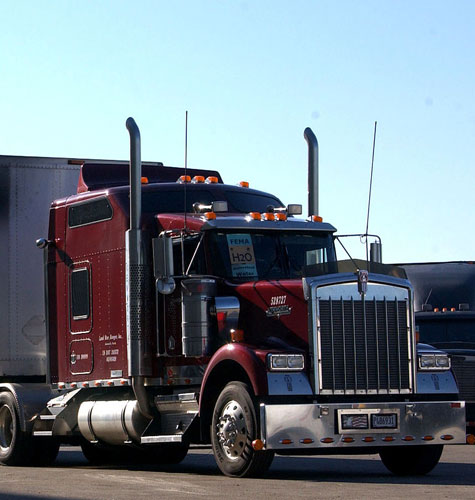 red semi-truck on highway